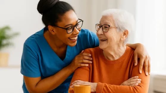 Caregiver and senior sharing a joyful moment